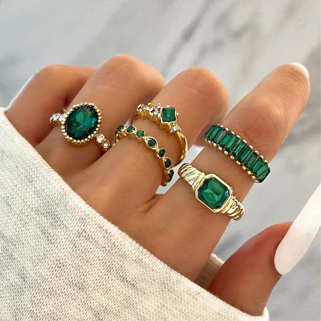 Luxurious Rings with Green Zircons in Gold